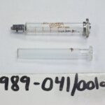 1989-041/001a-b - Syringe, Medical