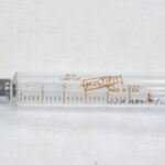 1989-041/001a-b - Syringe, Medical