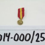 2014-000/255a-c - Medal