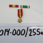 2014-000/255a-c - Medal